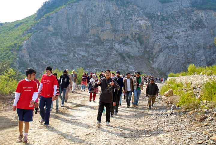 Hikers along the route in the northwestern region of Khyber Pakhtunkhwa, a province known for its mountains, valleys, hills, and farms. 