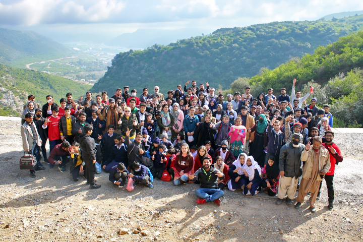 Group photos of hikers, parents and teachers at the end of an inclusive hike